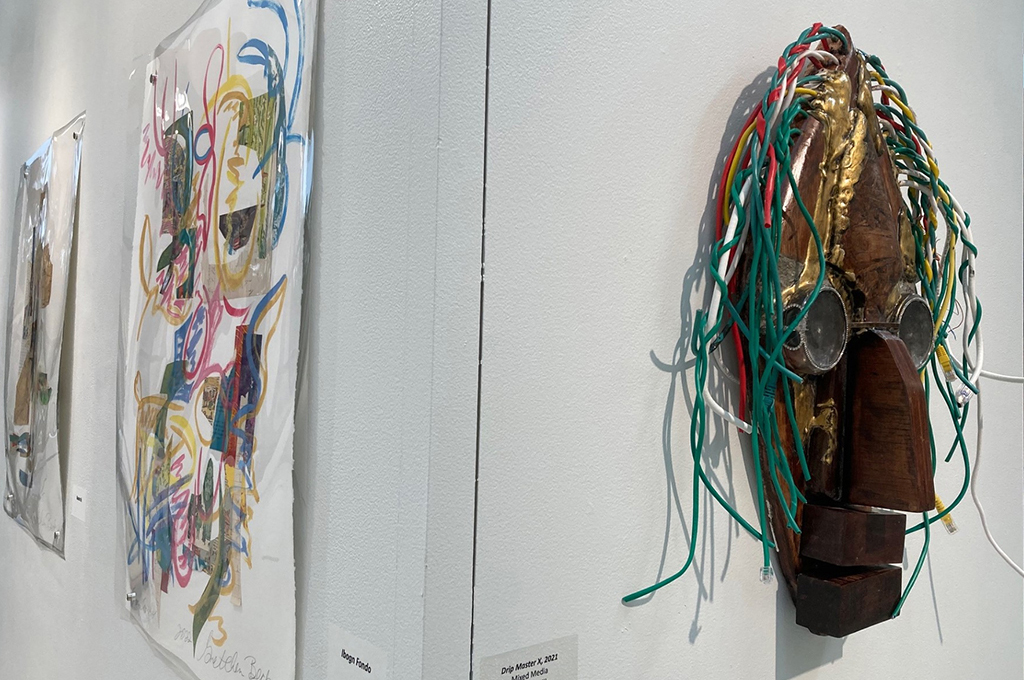 Photo of African-style mask and abstract painting